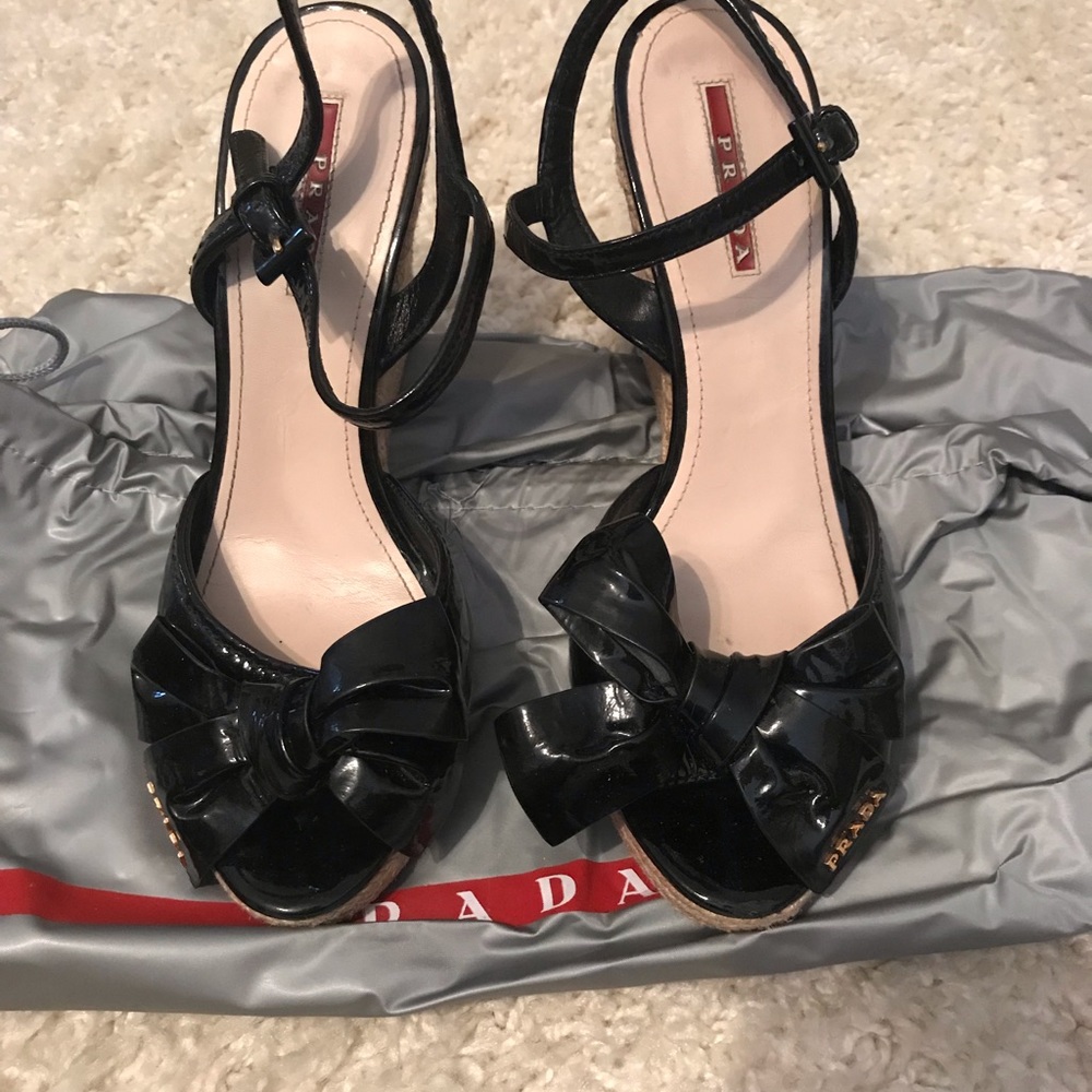 Prada black patent bow wedges